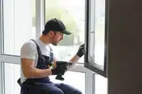 small-200x133-service-man-installing-window-with-measure-tape-2024-01-04-21-14-19-utc.jpg