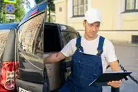 small-200x133-young-guy-working-in-a-courier-company-dressed-in-2023-11-27-05-09-18-utc.jpg